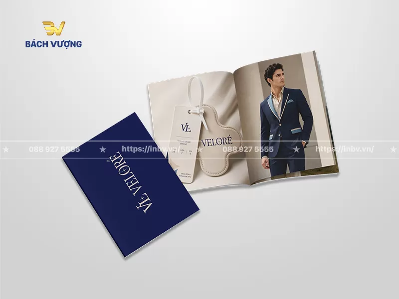 mẫu catalogue thời trang vest nam cao cấp gồm trang b&igrave;a xanh dượng đậm & c&aacute;c trang trong hiển thị h&igrave;nh ảnh người mẫu lịch l&atilde;m